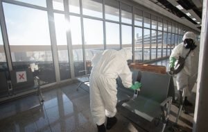 contents cleaners in hazmat suits