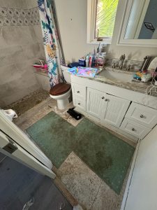 The heavy rain caused the drain to overflow spreading water into multiple areas of the home. photo courtesy of 1-800-Packouts
